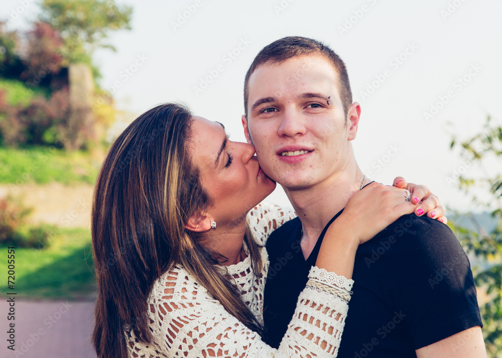 Fototapeta premium Young happy couple posing outdoor. Autumn scenery.