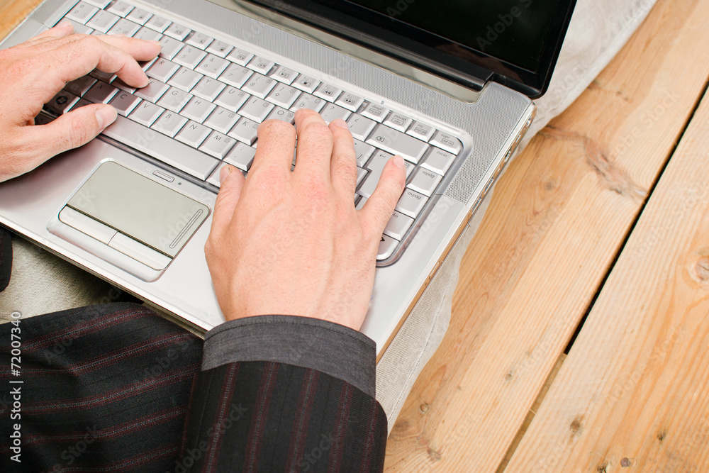 Fototapeta premium Businessman with a computer