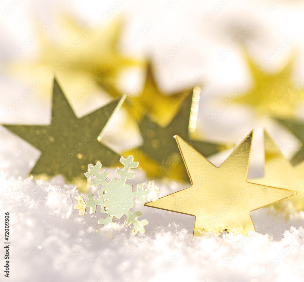 Magical background with golden stars and snowflakes Magical background with golden stars and snowflakes