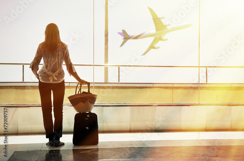 Girl at the airport window