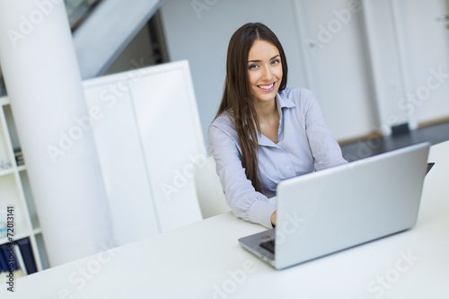 Young woman in the office