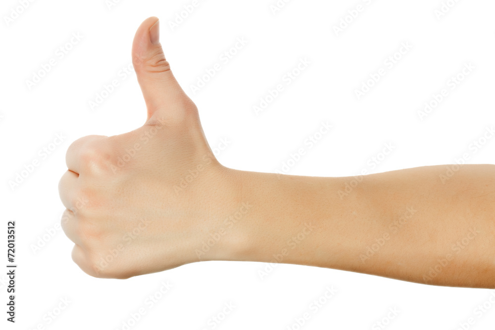 Closeup of male hand showing thumbs up sign against white backgr