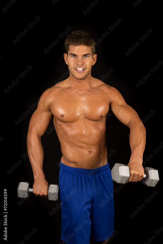man fitness no shirt on black dumbells side man fitness no shirt on black dumbells side