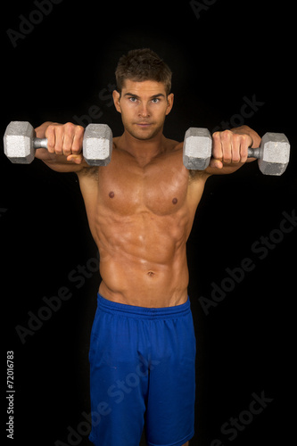 man fitness no shirt on black weights forward
