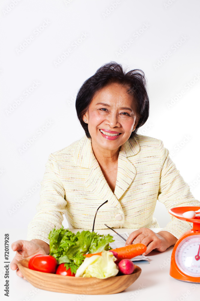 Nutritionist, A Nutritionist with a bowl of vegetable and scale Nutritionist, A Nutritionist with a bowl of vegetable and scale