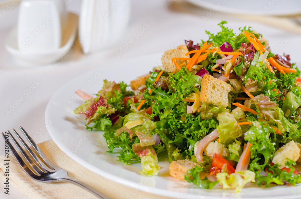 Delicious mixed salad with fried crunchy croutons Delicious mixed salad with fried crunchy croutons
