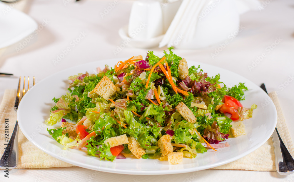 Delicious mixed salad with fried crunchy croutons Delicious mixed salad with fried crunchy croutons