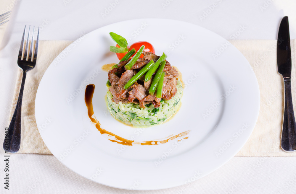 Tasty Beef Meat and Beans on Risotto Dish Tasty Beef Meat and Beans on Risotto Dish