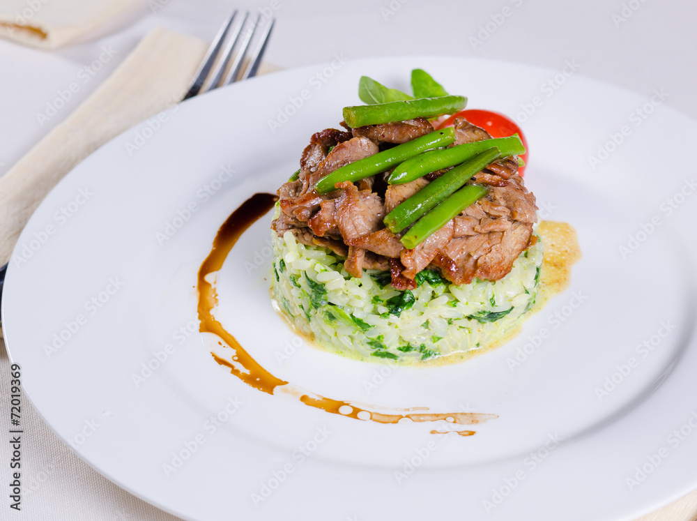 Tasty Beef Meat and Beans on Risotto Dish
