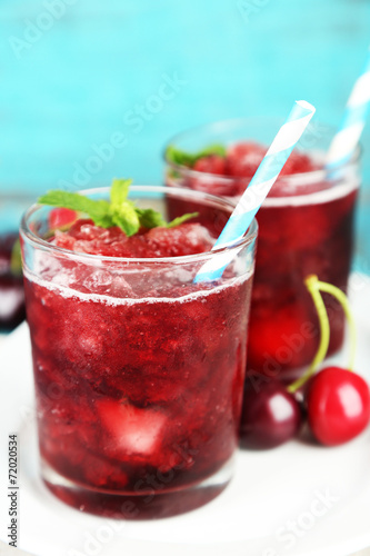 Wallpaper Mural Closeup of cherry granita in glasses, on color wooden Torontodigital.ca