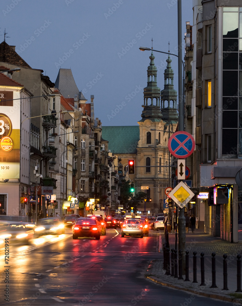 Naklejka premium Garbary street in Poznan at evening