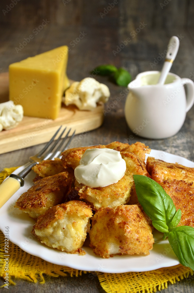 Fried cauliflower in cheese crisp. Fried cauliflower in cheese crisp.