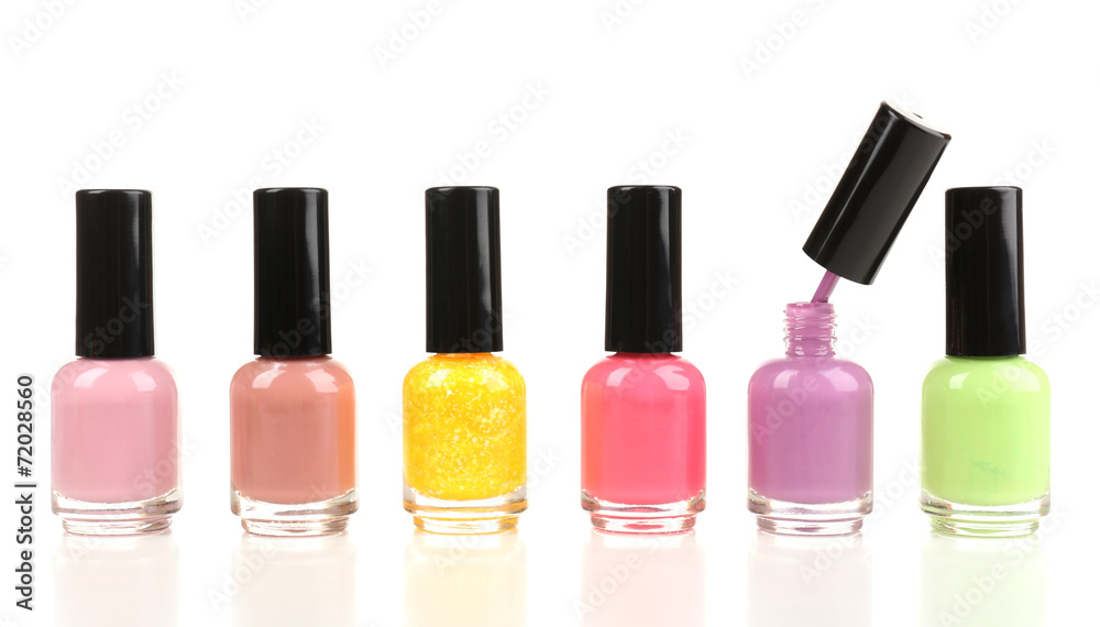 Colorful nail polishes isolated on white Colorful nail polishes isolated on white