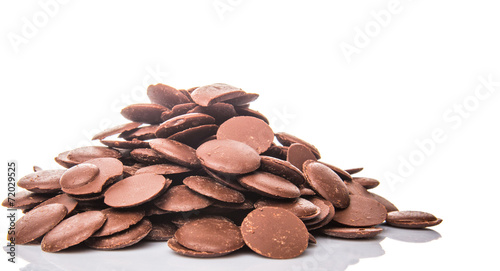 Chocolate button over white background