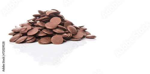 Chocolate button over white background
