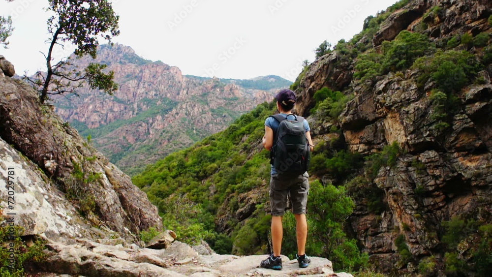 Young woman hiking in the mountains, Corsica, gorges de Spelunca