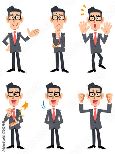 眼鏡をかけたスーツの男性 （正面向き)
