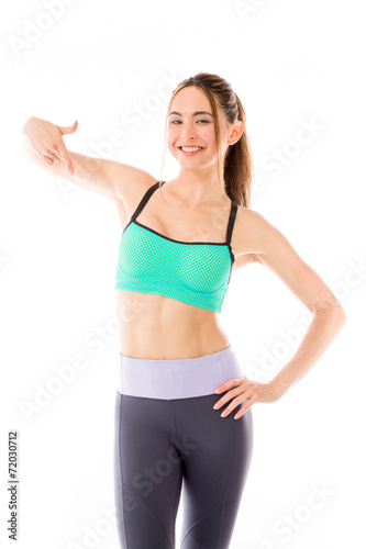 model isolated on plain background pointing to herself © bruno135_406