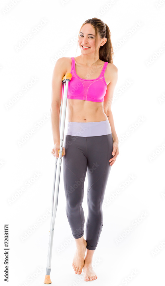 model isolated on white injured with crutch model isolated on white injured with crutch