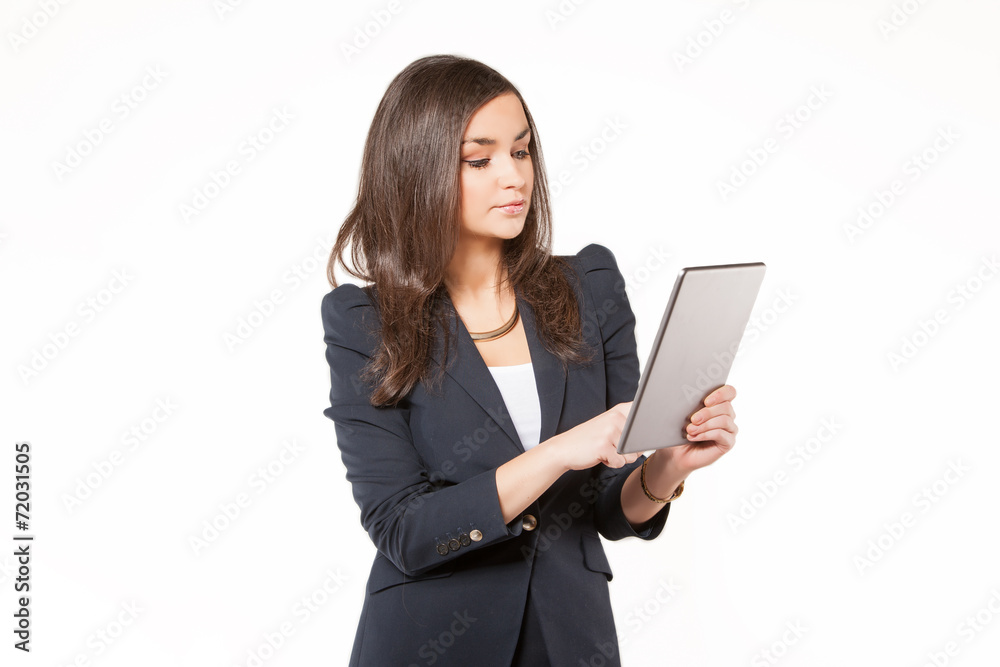 Young business woman working on tablet. Young business woman working on tablet.