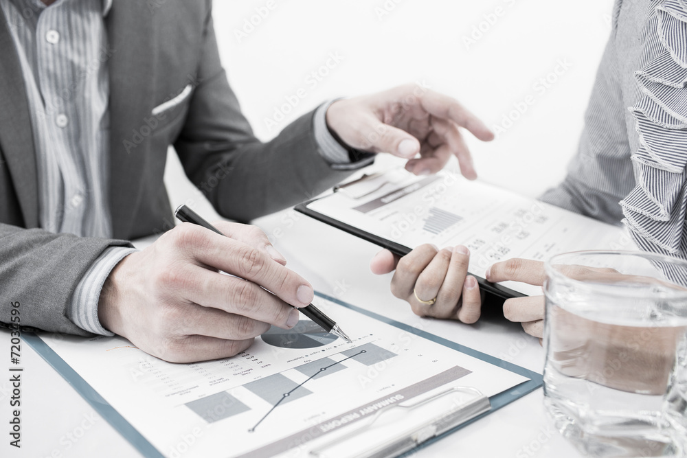 Business people discussing during a meeting Business people discussing during a meeting