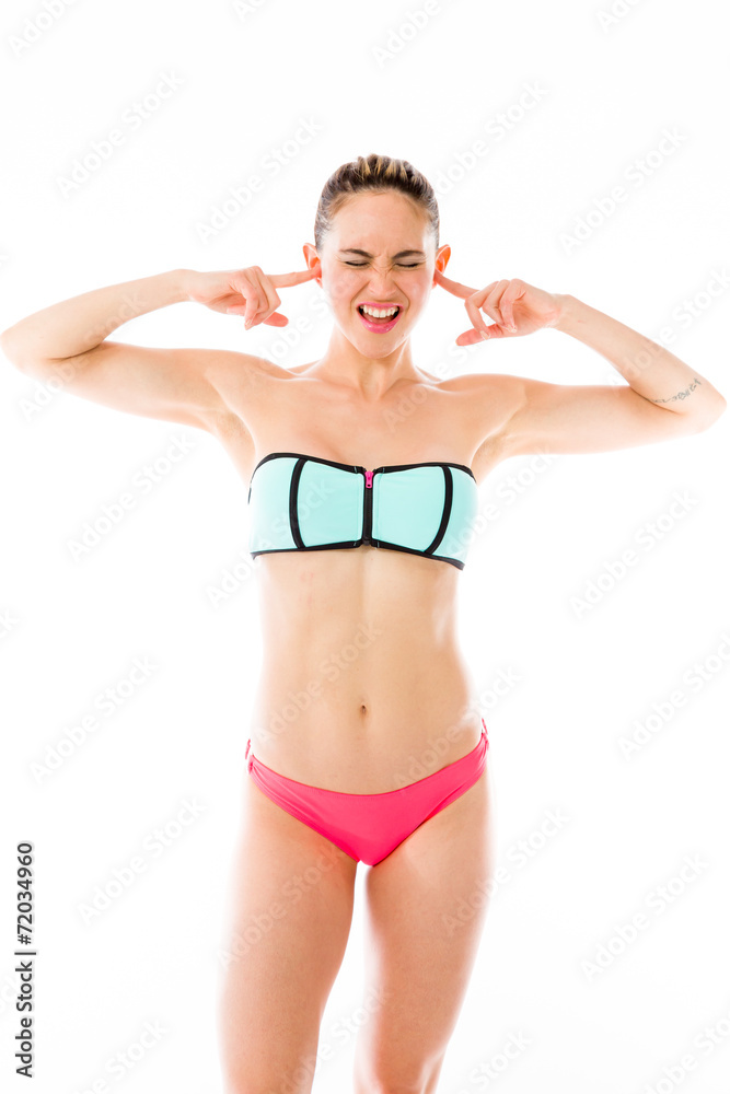 model isolated on plain background plugging ears with fingers model isolated on plain background plugging ears with fingers