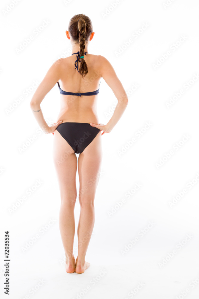 model isolated on plain background back hands on hips model isolated on plain background back hands on hips