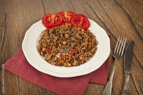Turkish Kokorec - lamb intestine food portion photo