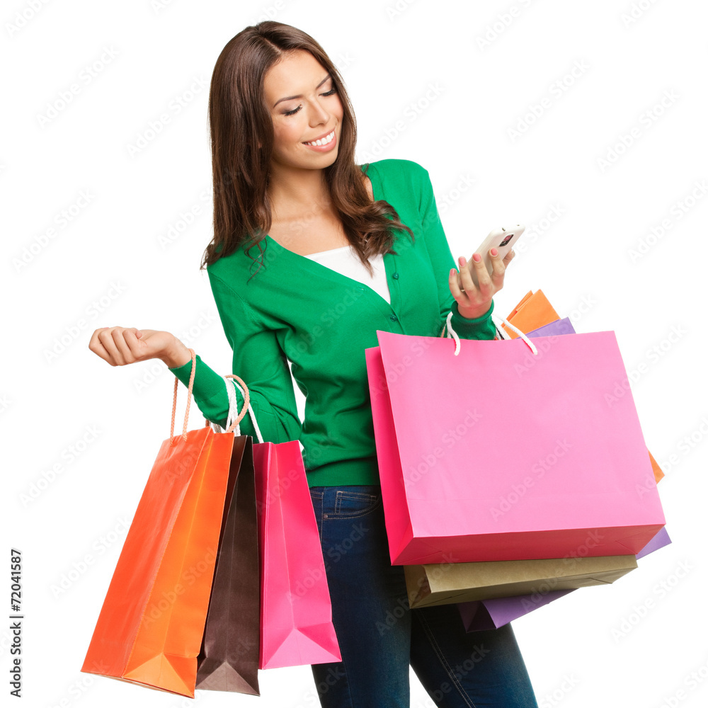 Young happy woman with shopping bags, isolated Young happy woman with shopping bags, isolated
