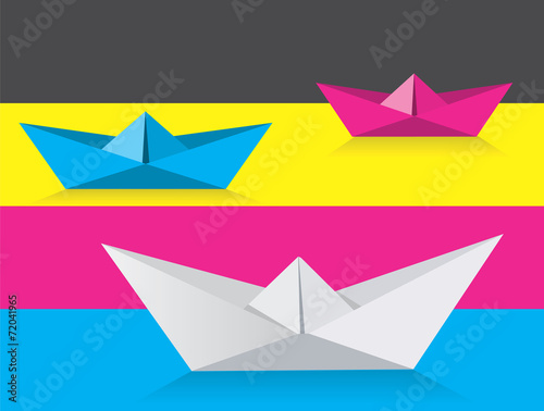 Fototapeta Naklejka Na Ścianę i Meble -  Origami boats on print colors background