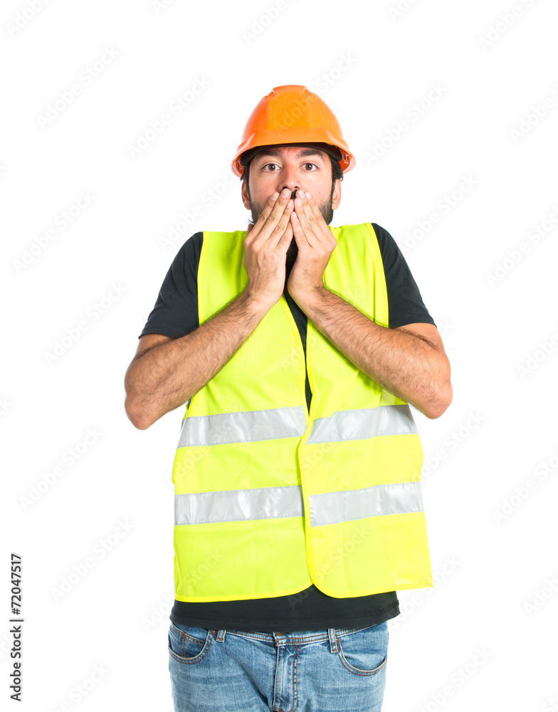 Workman doing surprise gesture over white background Workman doing surprise gesture over white background