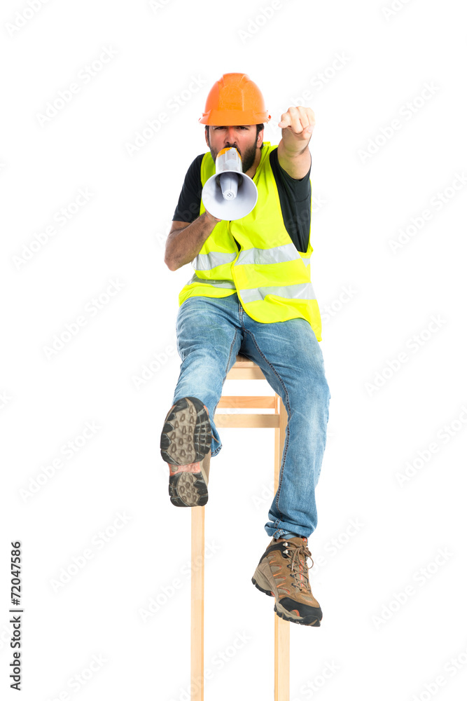 Workman shouting over isolated white background Workman shouting over isolated white background