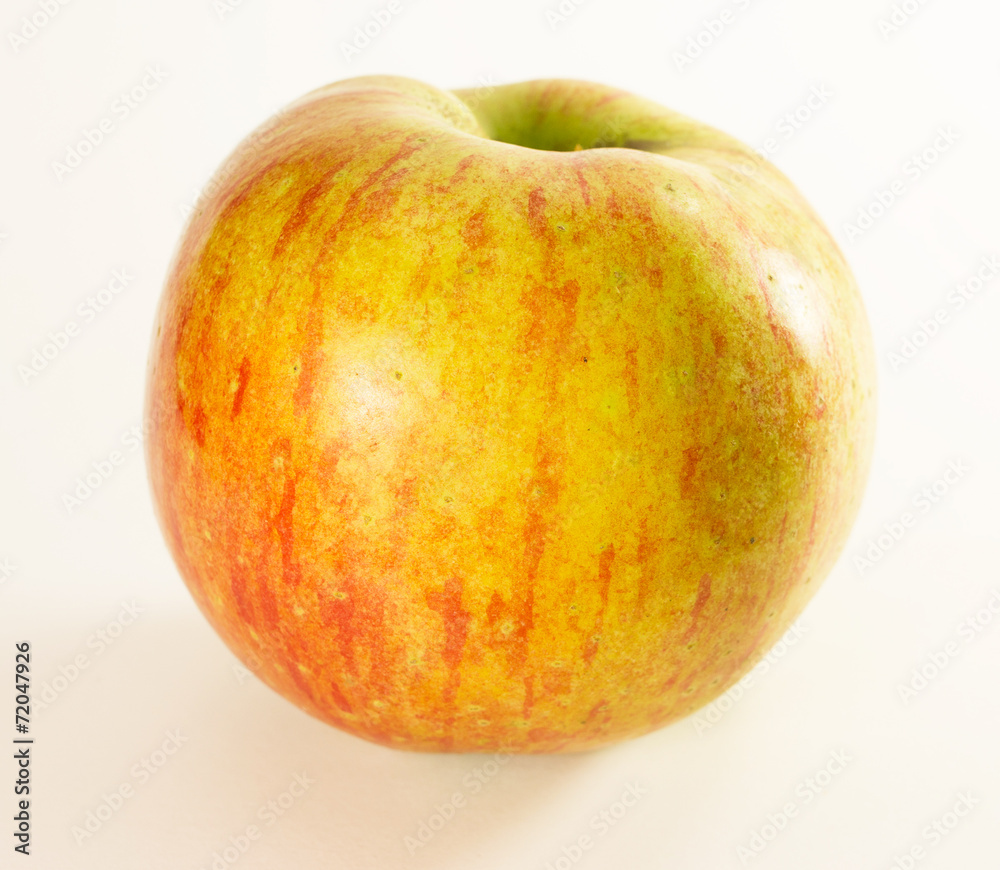 Sweet red apple on white background