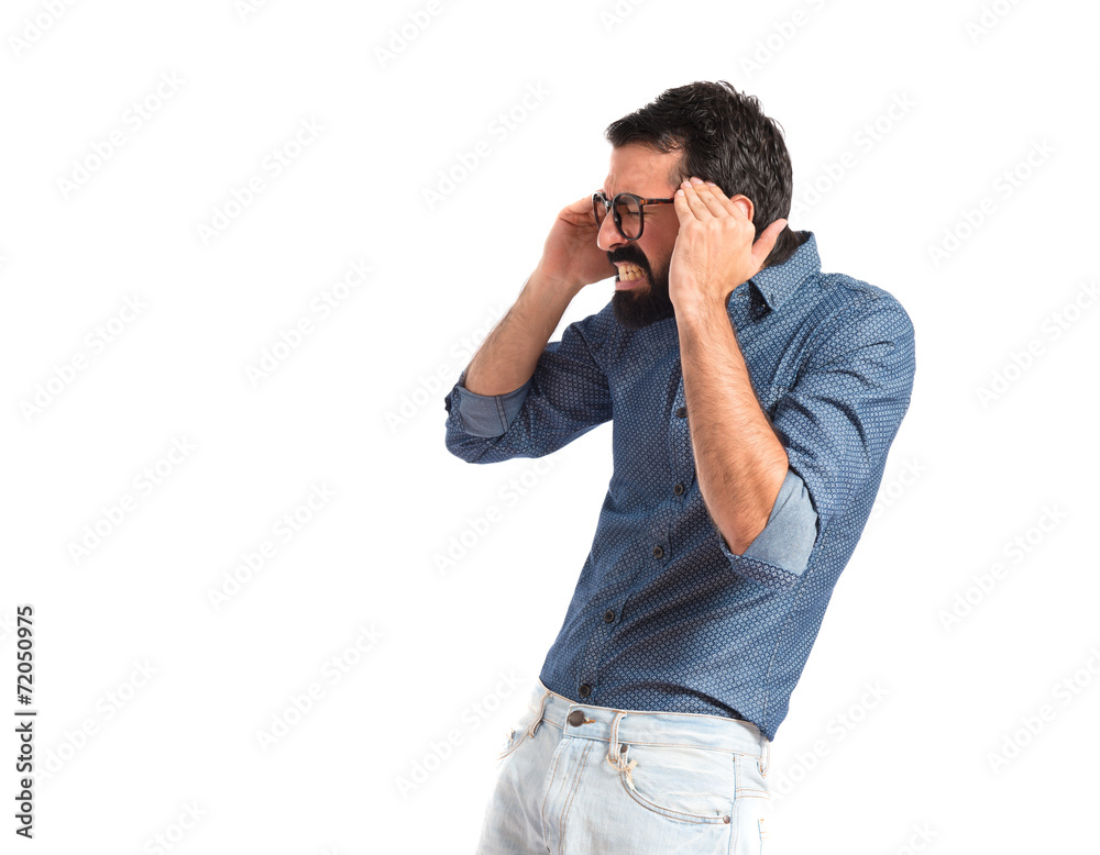 frustrated young hipster man over white background frustrated young hipster man over white background