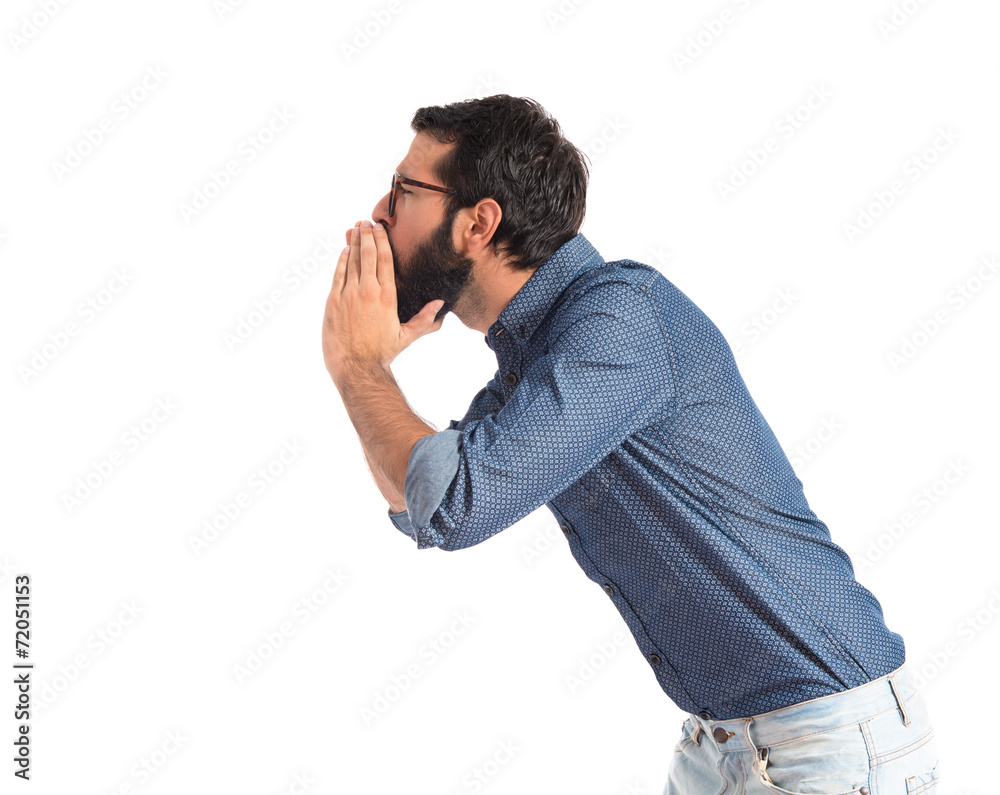Young hipster man shouting over white background Young hipster man shouting over white background