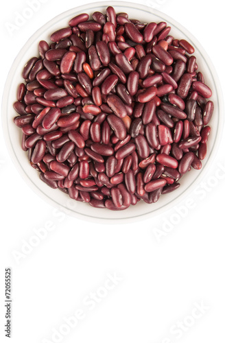 Red kidney beans in white bowl over white background