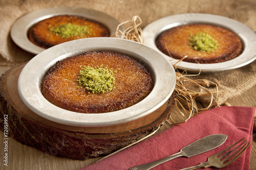 Turkish dessert kunefe with pistachio powder