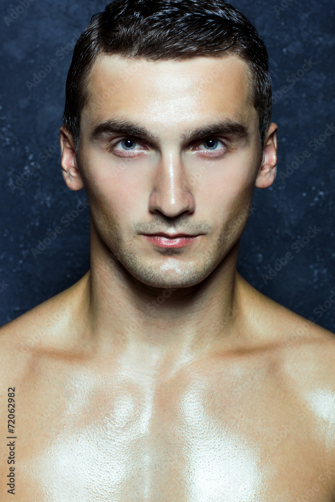 Male beauty concept. Portrait of fashionable and undressed young Male beauty concept. Portrait of fashionable and undressed young