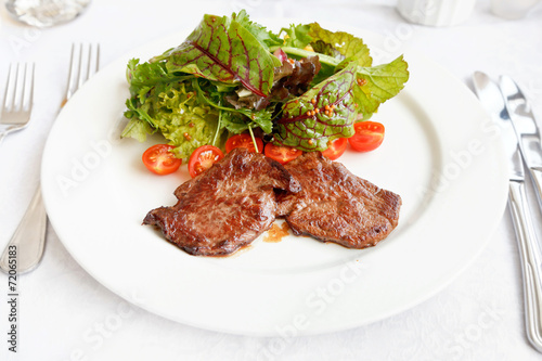hot salad with roast beef and lettuce