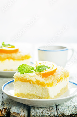 cake with orange, cream cheese and crumbs