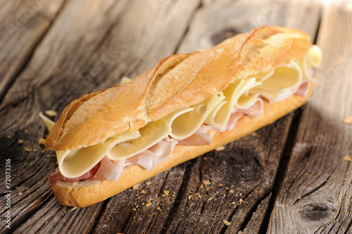 Baguette bread with ham and cheese photo