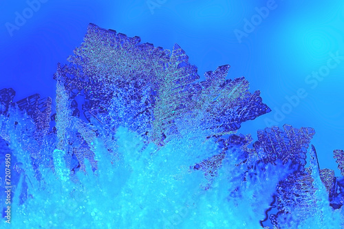 natural snowflake closeup on a blue background