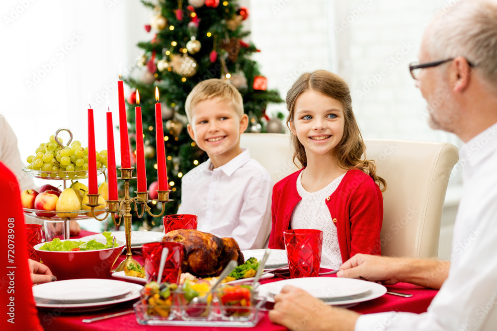 smiling family having holiday dinner at home smiling family having holiday dinner at home