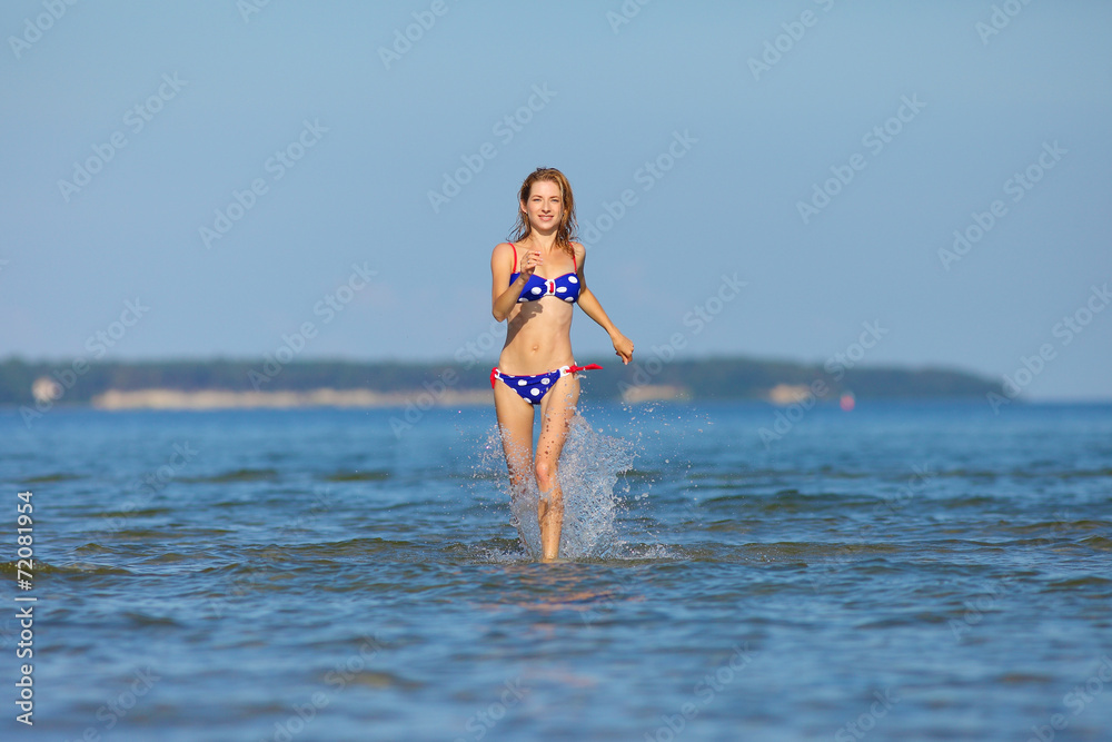 woman running in the water