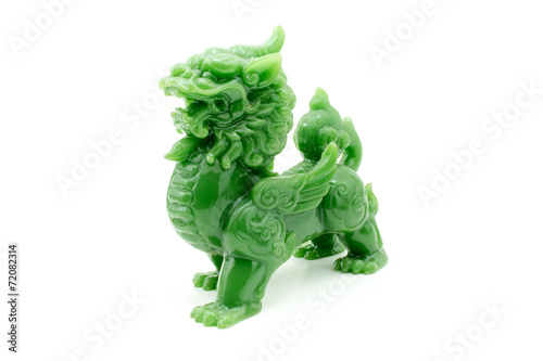 The lion statue the symbol of powerful in Chinese belief isolate