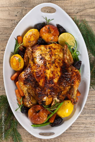 Whole Roasted holiday chicken with apples