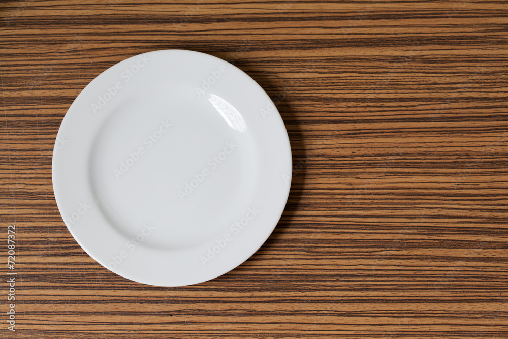Plate on Wood background Plate on Wood background