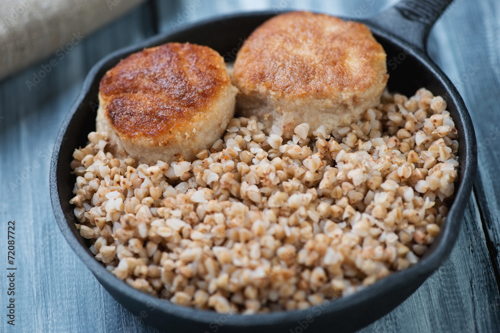 Buckwheat with meat cutlets, close-up, horizontal shot Buckwheat with meat cutlets, close-up, horizontal shot