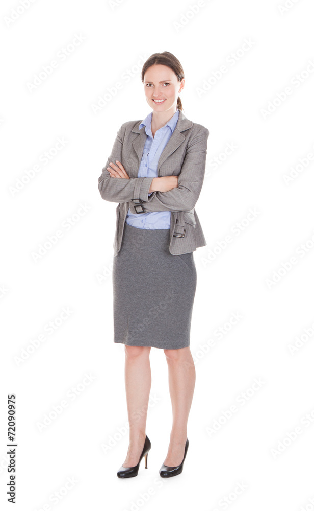 Portrait Of Smiling Businesswoman With Arms Crossed Portrait Of Smiling Businesswoman With Arms Crossed