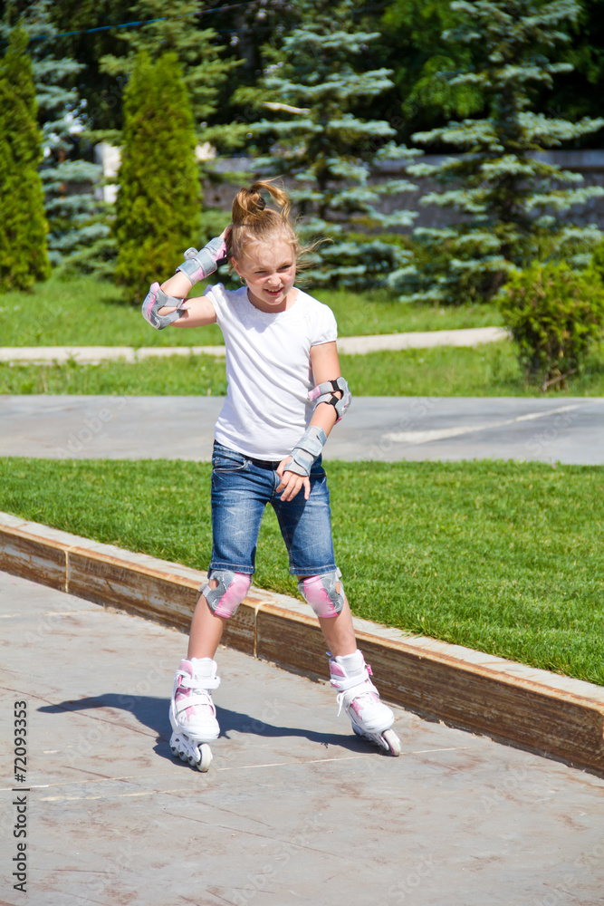 Learning girl on roller skates